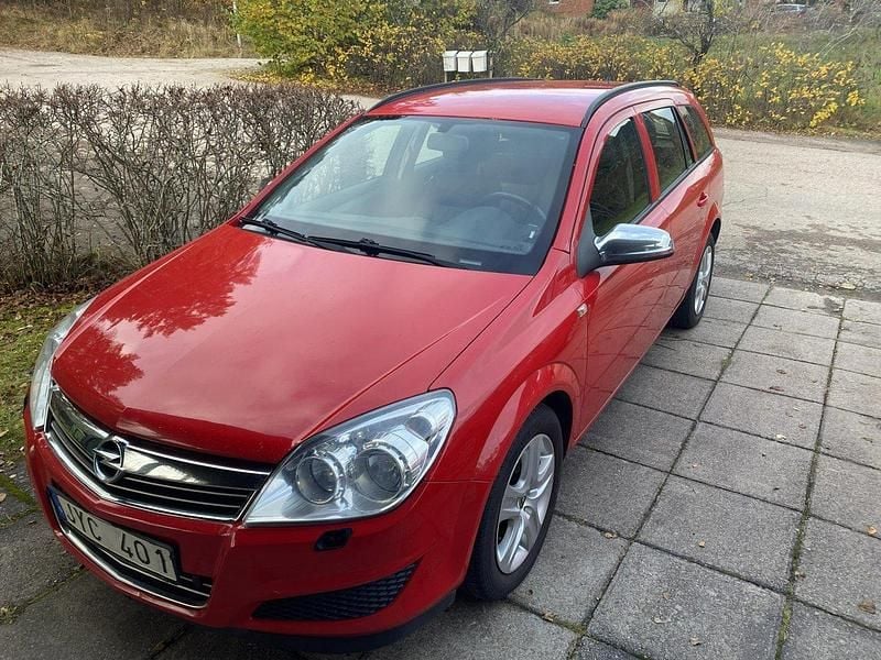 Röd Begagnad 2009 Opel Astra Kombi | 20 000 kr (Marknadspris) - Bild 1/4