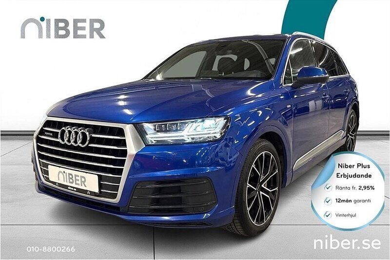 Blå Begagnad 2016 Audi Q7 S-Line SUV | 369 900 kr (Lite dyr) - Bild 1/4