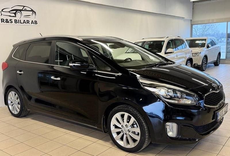 Svart Begagnad 2014 Kia Carens Minibuss | 89 000 kr (Marknadspris) - Bild 1/4