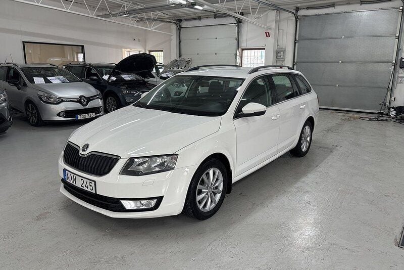 Vit Begagnad 2013 Skoda Octavia Kombi | 89 900 kr (Marknadspris) - Bild 1/4