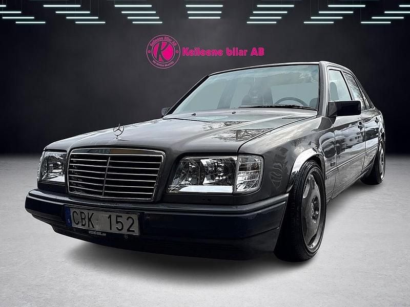 Mörkgrå Begagnad 1987 Mercedes E300 Sedan | 48 900 kr - Bild 1/4