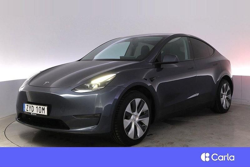 Grå Begagnad 2022 Tesla Model Y Long Range AWD SUV | 369 900 kr (Marknadspris) - Bild 1/4