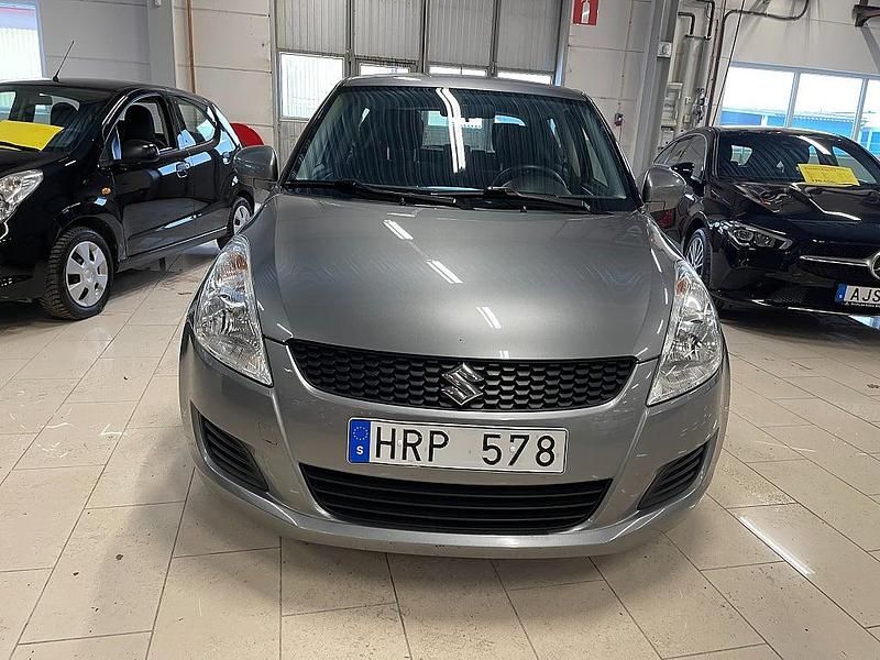 Begagnad Suzuki Swift 94 HK (69 kW) 2011 Gråmetallic Halvkombi
