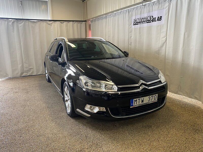Flerfärgad (flerf) Begagnad 2013 Citroën C5 Kombi | 105 000 kr (Dyr) - Bild 1/4