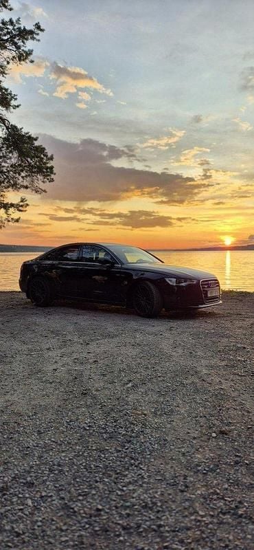 Svart Begagnad 2013 Audi A6 Ambition Sedan | 150 000 kr (Marknadspris) - Bild 1/4