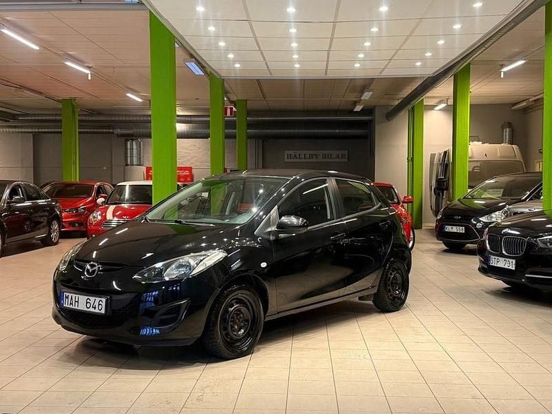 Svart Begagnad 2011 Mazda 2 Halvkombi | 44 900 kr (Marknadspris) - Bild 1/4