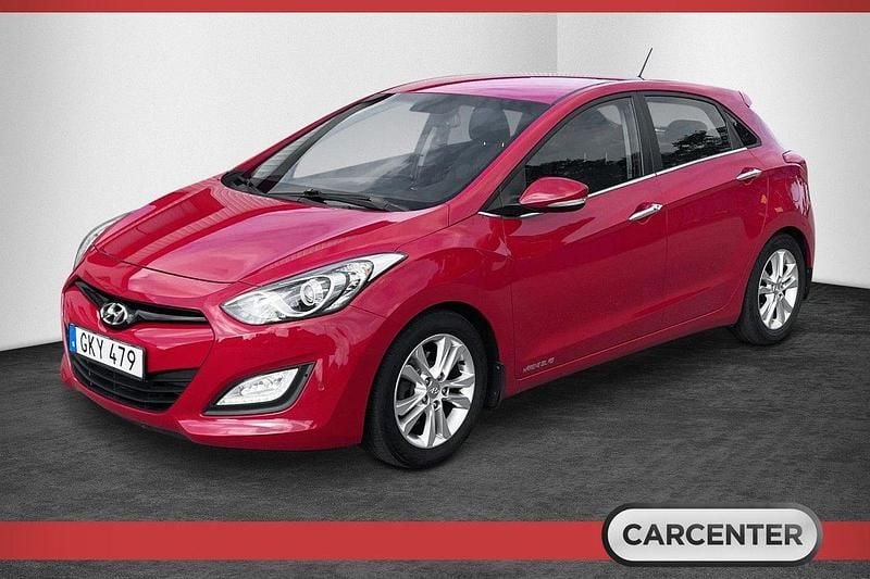 Röd Begagnad 2012 Hyundai i30 Premium Halvkombi | 94 500 kr (Marknadspris) - Bild 1/4