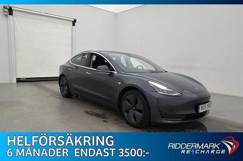 Grå Begagnad 2020 Tesla Model 3 Long Range AWD Sedan | 239 800 kr (Marknadspris) - Bild 1/3