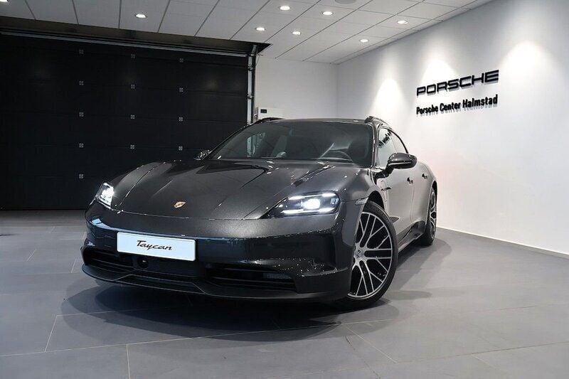 Mörkgrå (grey) Begagnad 2024 Porsche Taycan Sport Turismo Sedan | 1 285 000 kr - Bild 1/4