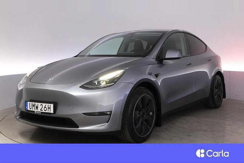 Grå Begagnad 2024 Tesla Model Y Long Range AWD SUV | 504 900 kr - Bild 1/4