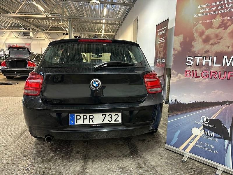 Begagnad BMW 118 Sport Line 143 HK (105 kW) 2014 Svart Halvkombi