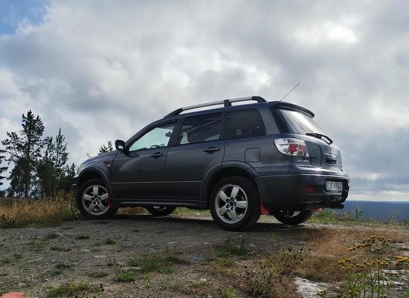 Grå Begagnad 2007 Mitsubishi Outlander SUV | 35 000 kr (Marknadspris) - Bild 1/4