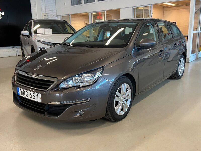 Mörkgrå (grå) Begagnad 2015 Peugeot 308 Active Kombi | 99 900 kr (Marknadspris) - Bild 1/3