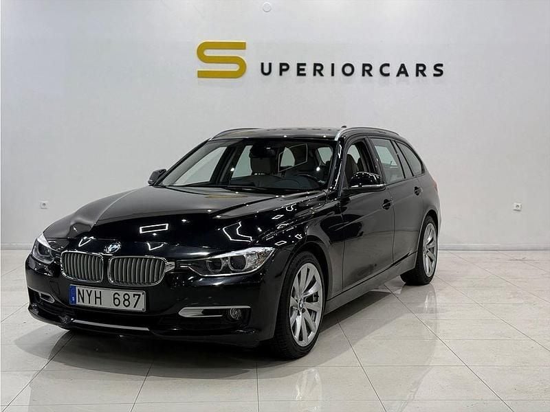 Svart Begagnad 2014 BMW 320 Kombi | 149 900 kr (Lite dyr) - Bild 1/4