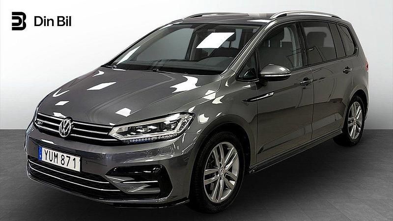 Mörkgrå (indium grey metallic) Begagnad 2018 VW Touran R-line Minibuss | 289 900 kr (Lite dyr) - Bild 1/4