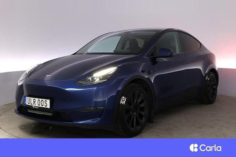Blå Begagnad 2022 Tesla Model Y Long Range AWD SUV | 426 900 kr (Marknadspris) - Bild 1/3