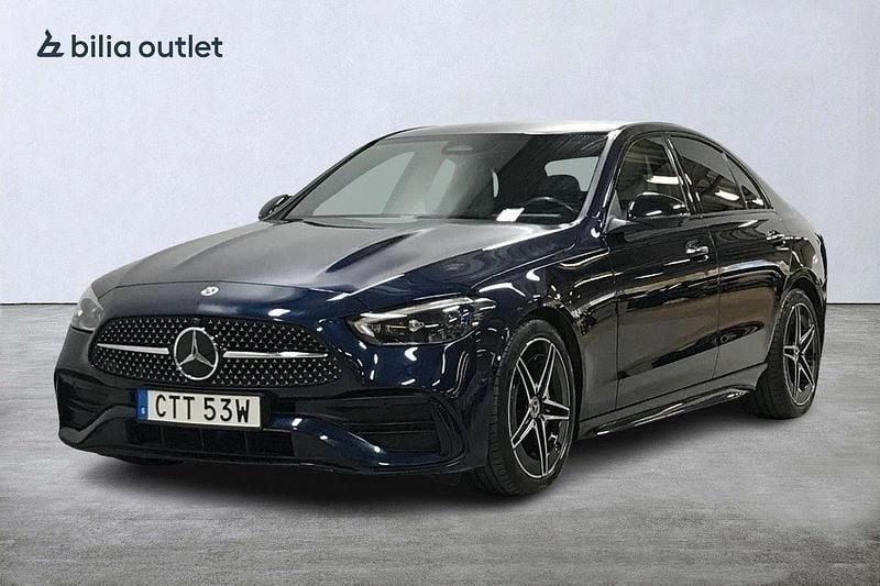 Mörkblå Begagnad 2021 Mercedes C300 AMG Sedan | 449 900 kr - Bild 1/4