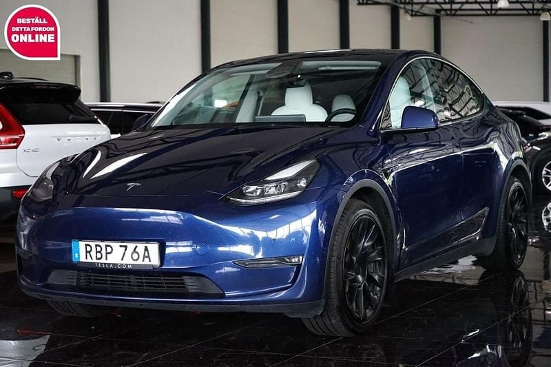 Blå Begagnad 2022 Tesla Model Y Long Range SUV | 289 500 kr - Bild 1/4