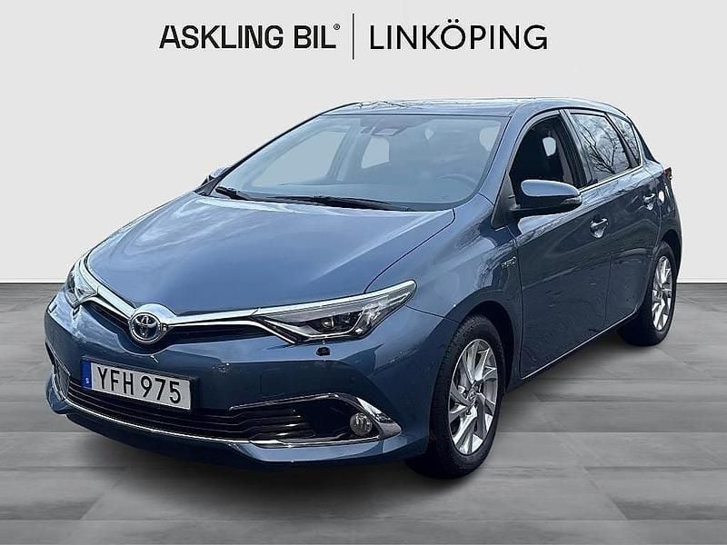 Blå Begagnad 2016 Toyota Auris Hybrid Executive Halvkombi | 169 000 kr (Marknadspris) - Bild 1/4
