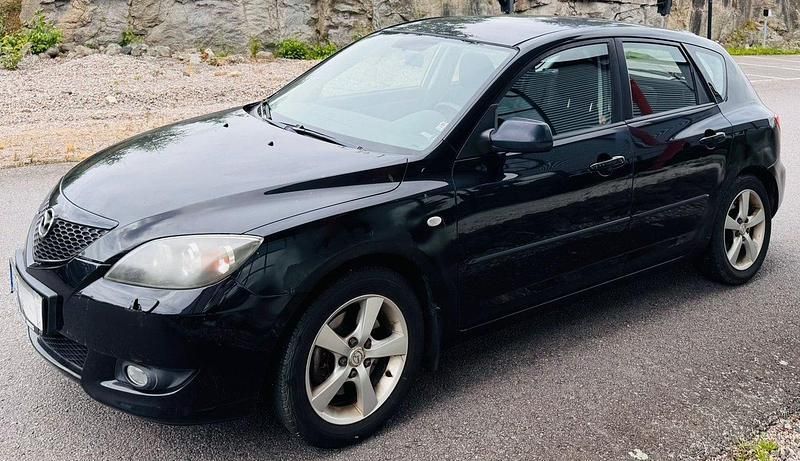 Svart Begagnad 2005 Mazda 3 Inclusive Halvkombi | 32 900 kr - Bild 1/4