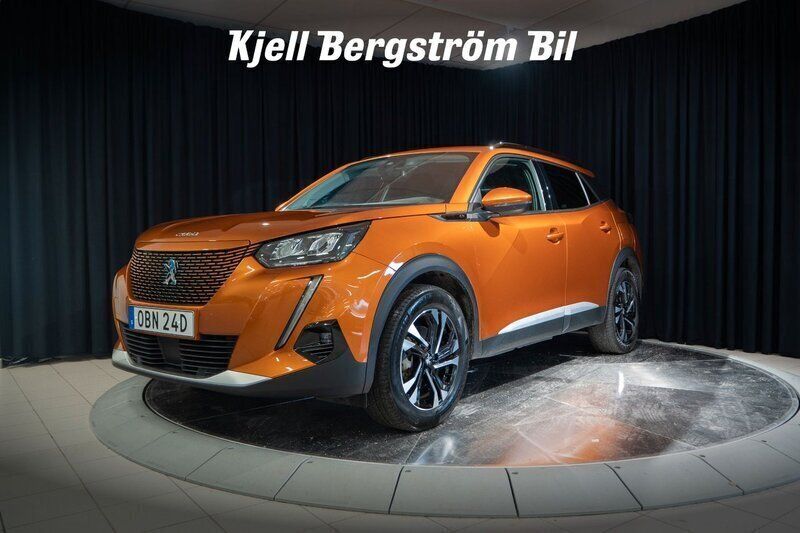 Orange Begagnad 2021 Peugeot e-2008 SUV | 194 900 kr (Marknadspris) - Bild 1/4