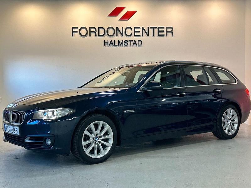 Blå Begagnad 2014 BMW 520 Kombi | 189 900 kr (Lite dyr) - Bild 1/4
