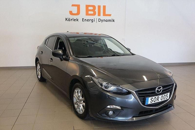 Grå Begagnad 2016 Mazda 3 Inclusive Halvkombi | 144 900 kr (Marknadspris) - Bild 1/4