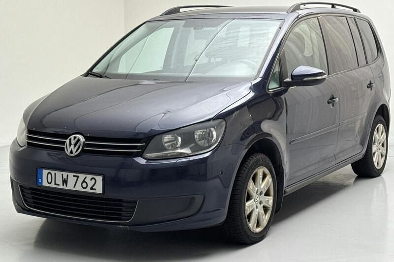 Mörkblå Begagnad 2014 VW Touran Minibuss | 35 000 kr - Bild 1/4
