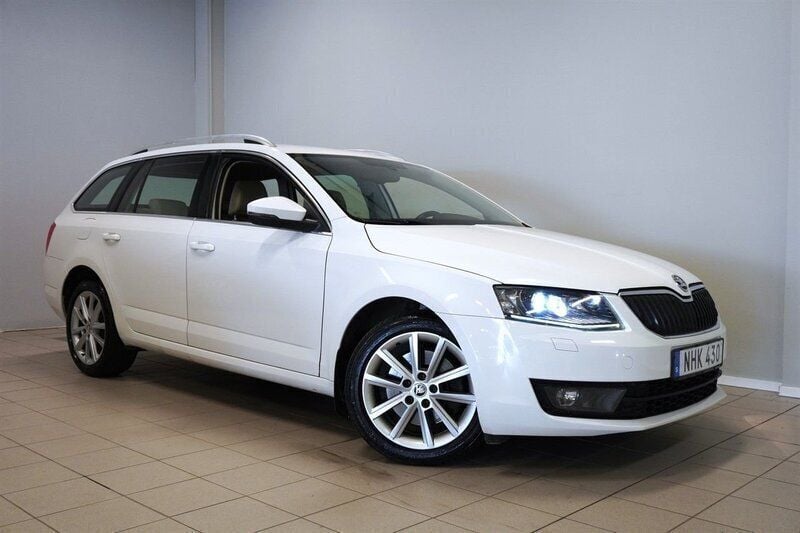 Vit Begagnad 2014 Skoda Octavia Elegance Kombi | 84 900 kr (Marknadspris) - Bild 1/4