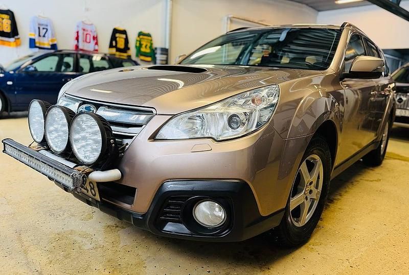 Begagnad Subaru Outback 150 HK (110 kW) 2013 Brun Kombi