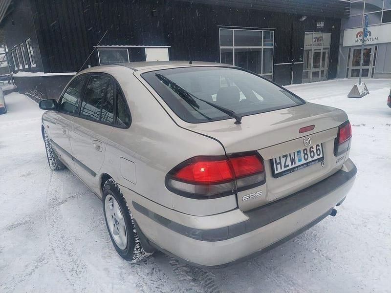 Begagnad Mazda 626 116 HK (85 kW) 1999 Brun Halvkombi