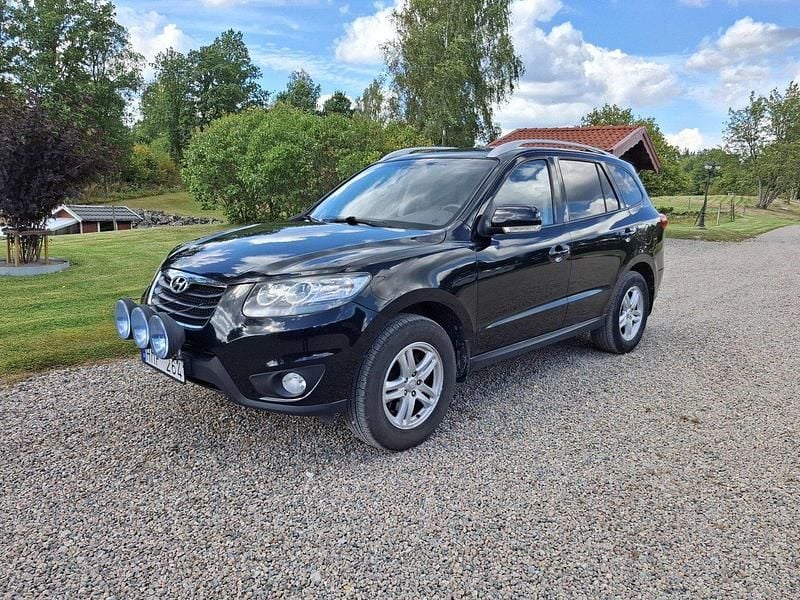 Svart Begagnad 2011 Hyundai Santa Fe SUV | 68 000 kr (Marknadspris) - Bild 1/3