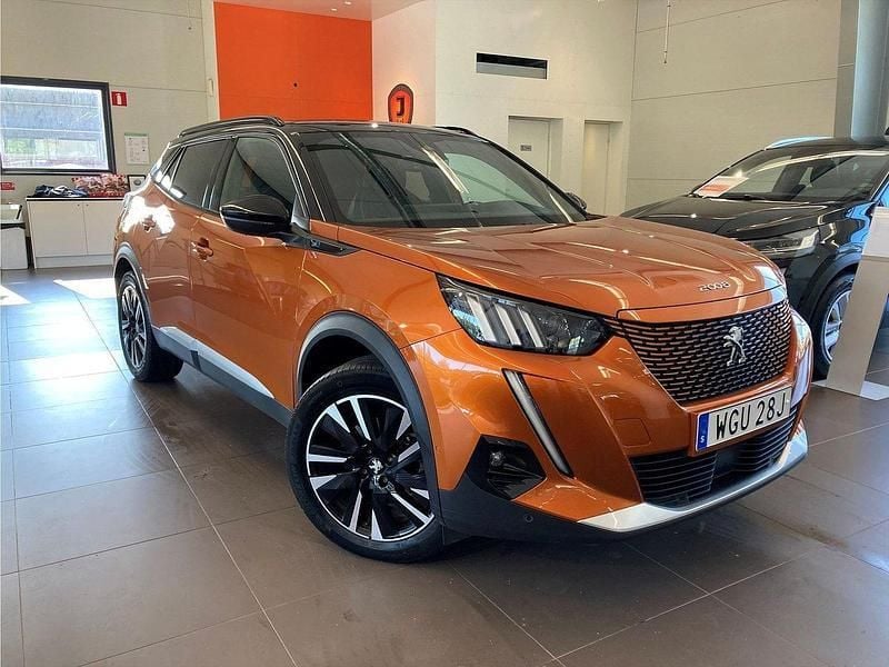 Orange Begagnad 2021 Peugeot e-2008 GT SUV | 204 900 kr (Marknadspris) - Bild 1/4