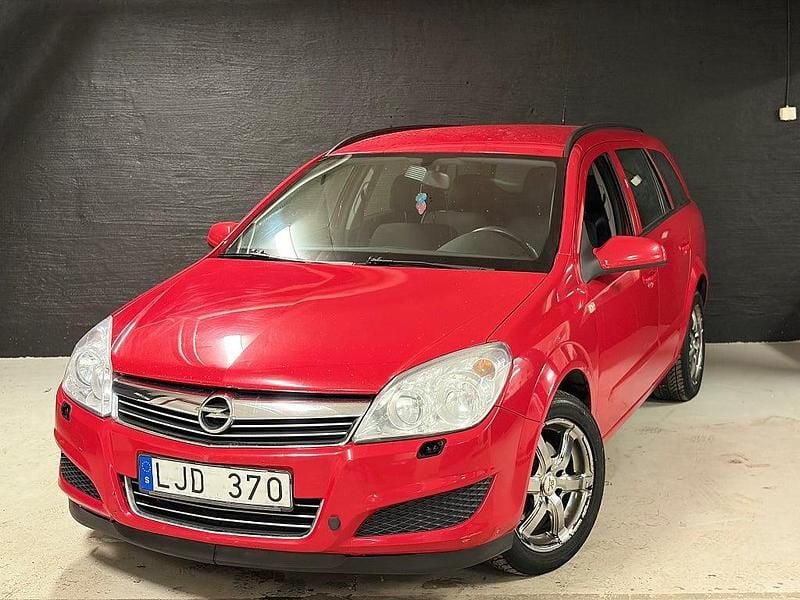 Röd Begagnad 2008 Opel Astra Kombi | 24 900 kr (Marknadspris) - Bild 1/4