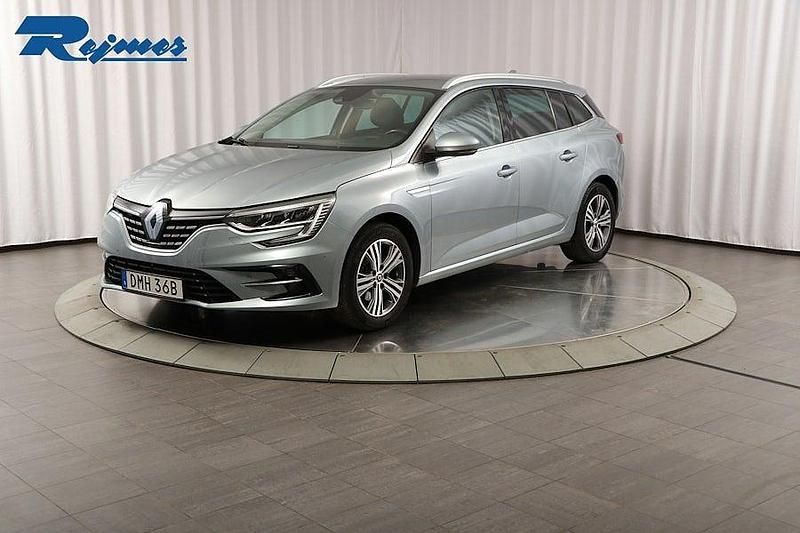 Grå baltisk metallic kqd Begagnad 2021 Renault Mégane IV Intens Kombi | 159 800 kr (Marknadspris) - Bild 1/4