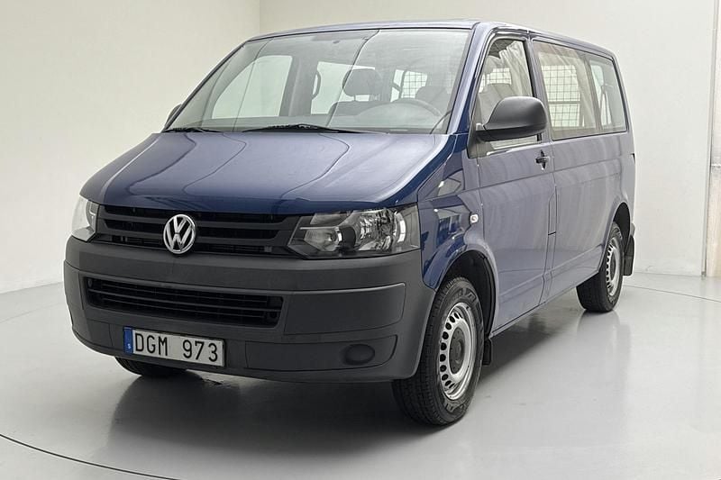Mörkblå Begagnad 2012 VW Caravelle Minibuss | 199 000 kr - Bild 1/4