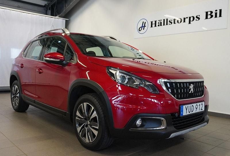 Mörkröd (röd) Begagnad 2017 Peugeot 2008 SUV | 129 900 kr (Marknadspris) - Bild 1/4
