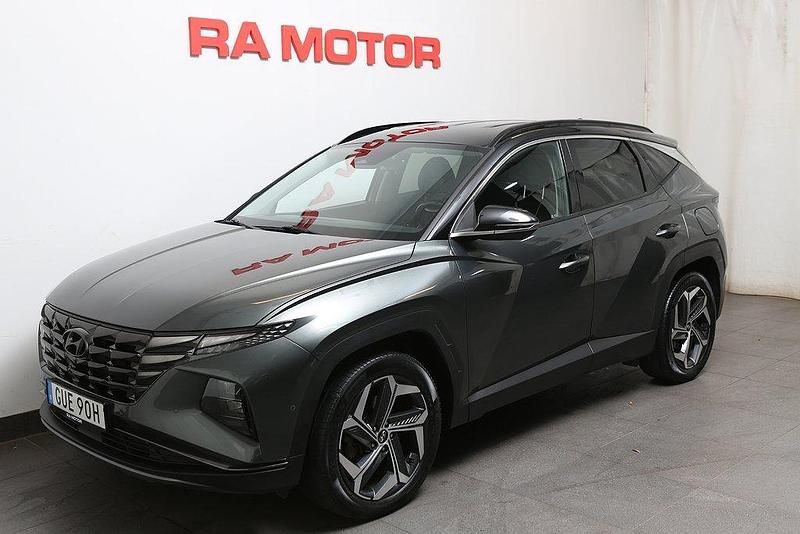 Grå Begagnad 2021 Hyundai Tucson Advanced SUV | 309 900 kr (Marknadspris) - Bild 1/3