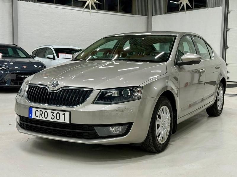 Brunmet Begagnad 2014 Skoda Octavia Elegance Kombi | 59 900 kr (Marknadspris) - Bild 1/4
