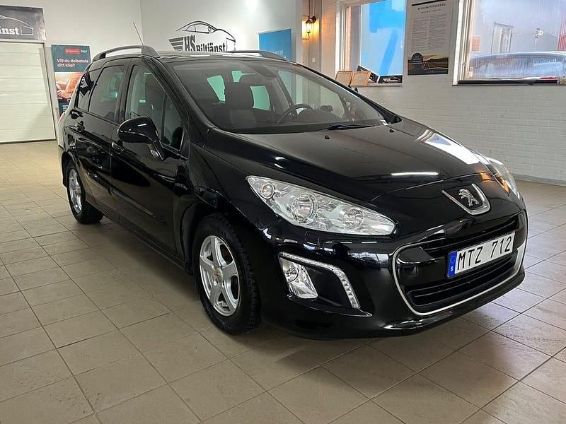 Begagnad Peugeot 308 SW 112 HK (82 kW) 2012 Svart Kombi