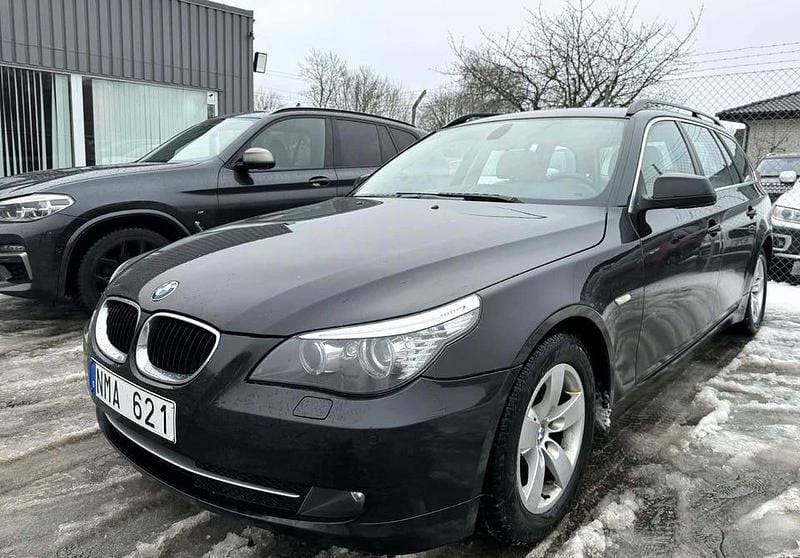 Begagnad BMW 520 177 HK (130 kW) 2010 Svart Kombi