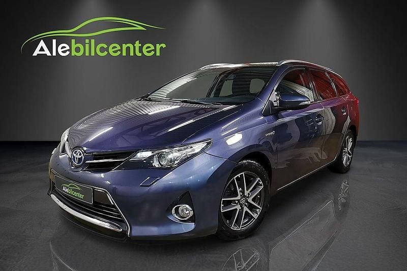 Mörkblå Begagnad 2014 Toyota Auris Touring Sports Edition Kombi | 124 900 kr (Marknadspris) - Bild 1/4