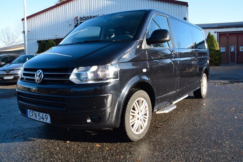 Svart Begagnad 2014 VW Caravelle Comfortline Minibuss | 289 900 kr - Bild 1/4