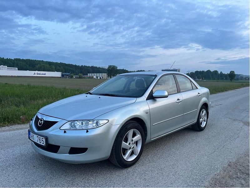 Silver Begagnad 2004 Mazda 6 Sedan | 38 000 kr (Lite dyr) - Bild 1/4