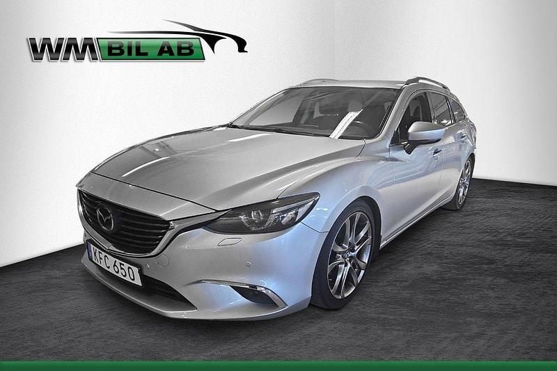 Grå Begagnad 2016 Mazda 6 Optimum Kombi | 199 000 kr (Marknadspris) - Bild 1/4