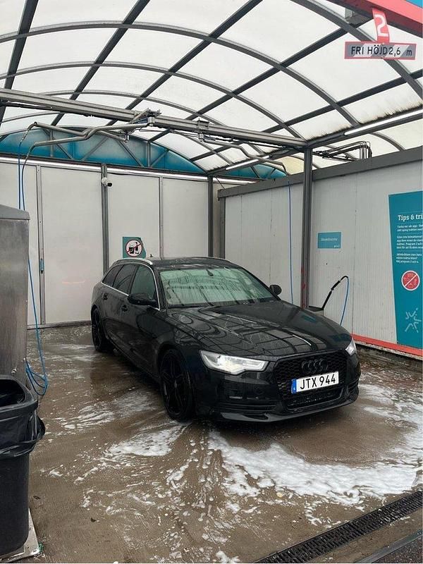 Svart Begagnad 2013 Audi A6 Ambition Kombi | 124 990 kr - Bild 1/4