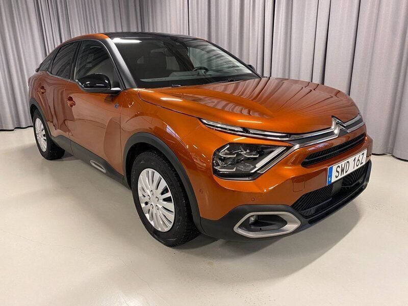 Orange Begagnad 2021 Citroën e-C4 Exclusive Halvkombi | 209 700 kr (Bra pris) - Bild 1/3