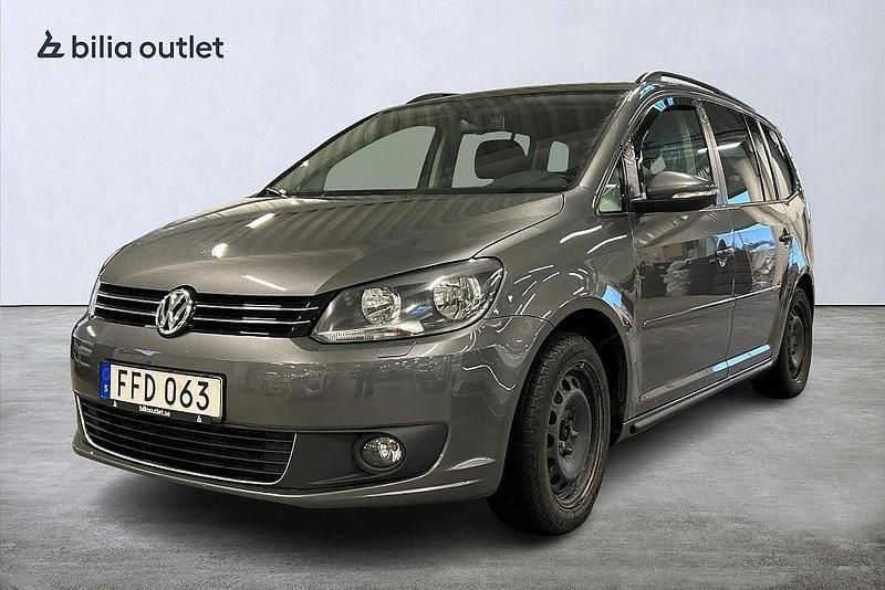 Grå Begagnad 2015 VW Touran Minibuss | 114 900 kr (Marknadspris) - Bild 1/3