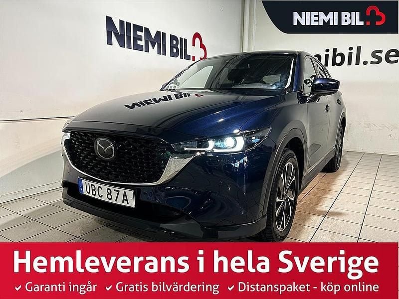 Blå Begagnad 2021 Mazda CX-5 Cosmo SUV | 349 900 kr (Dyr) - Bild 1/3