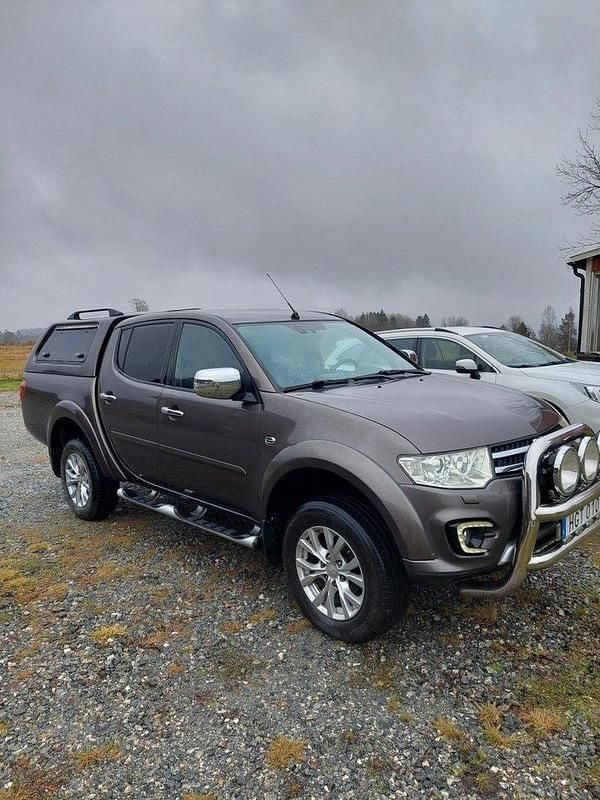Brun Begagnad 2014 Mitsubishi L200 Pickup | 169 000 kr (Marknadspris) - Bild 1/4
